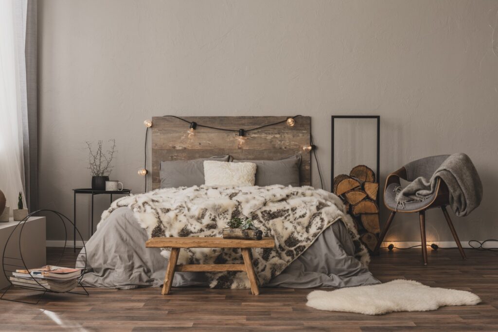 copy-space-on-empty-grey-wall-of-stylish-bedroom